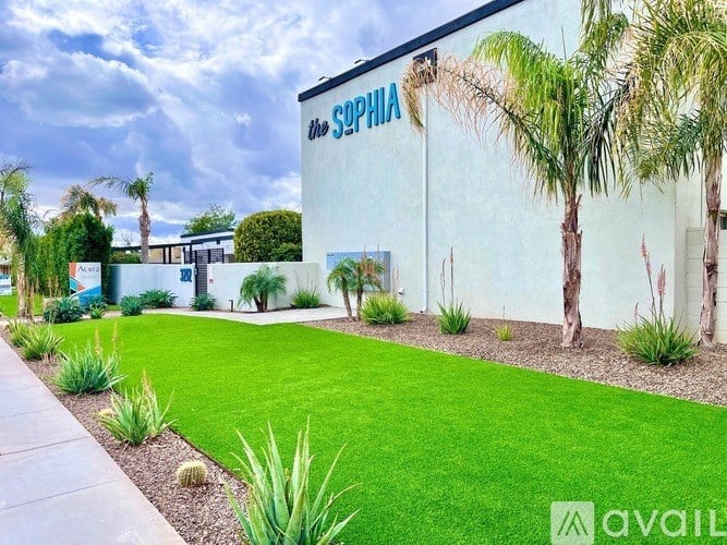 A building with a sign that says "SPHIA" on it.