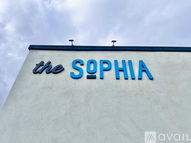 The sign on the building reads "The Sophia.".
