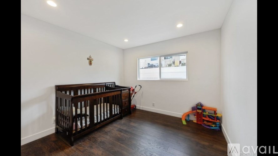 A baby's room with a crib and toys.