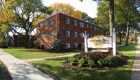 A red brick building with a sign that says Westview Heights.