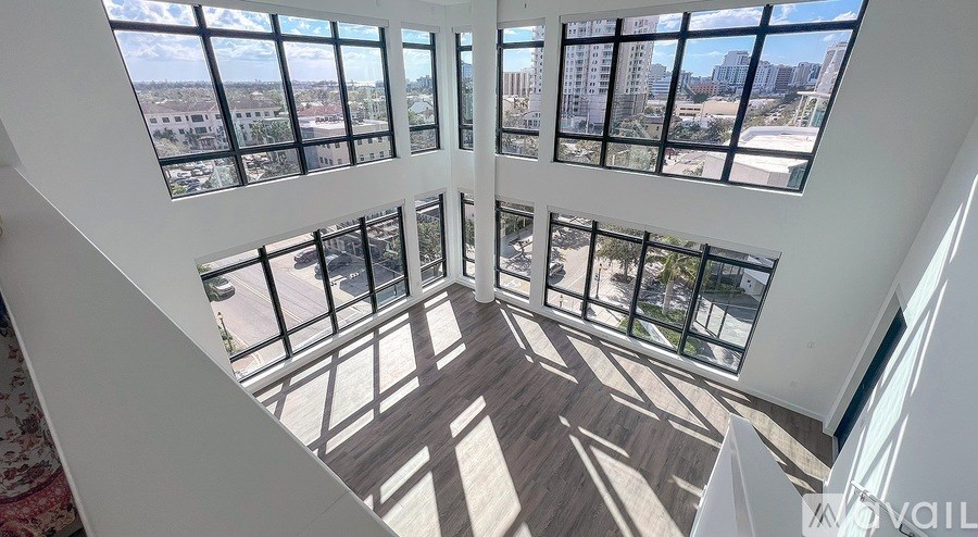 A view from the top of a building looking down at a cityscape.