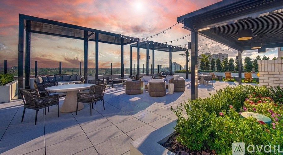 A patio area with tables and chairs is available for use.