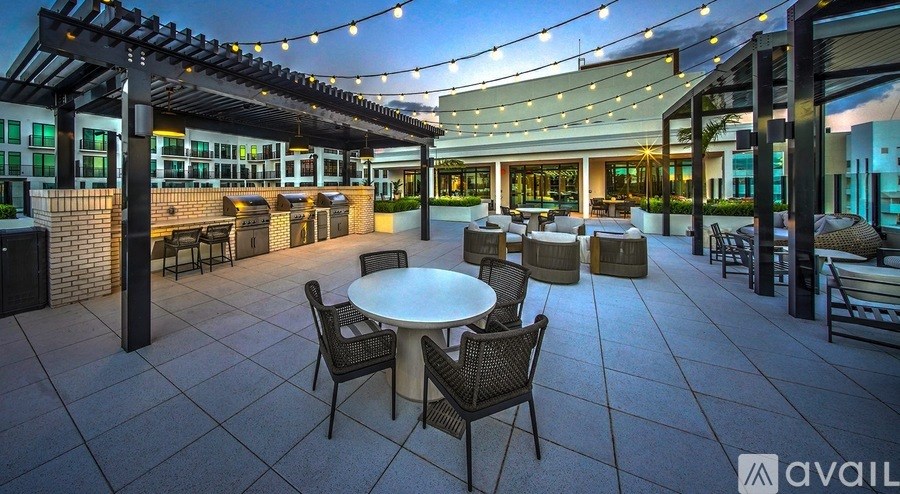 A patio area with tables and chairs is available for use.