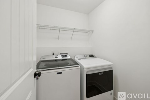 A small kitchen with a microwave and oven.