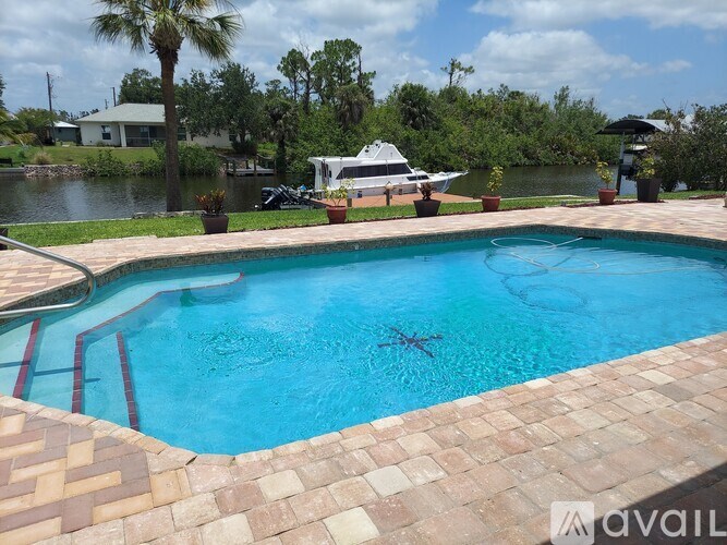 A pool with a starfish decoration in the middle of it.
