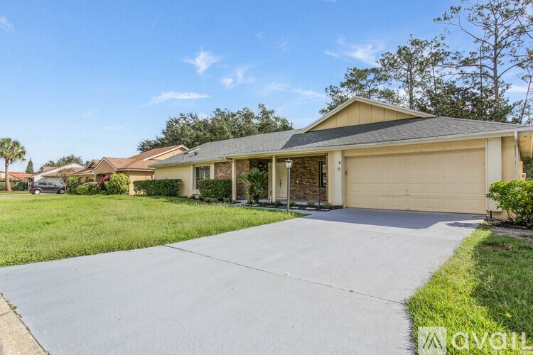 A room with a window covered by a green and white curtain.