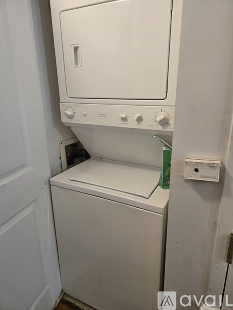 A white dishwasher is installed in a kitchen.