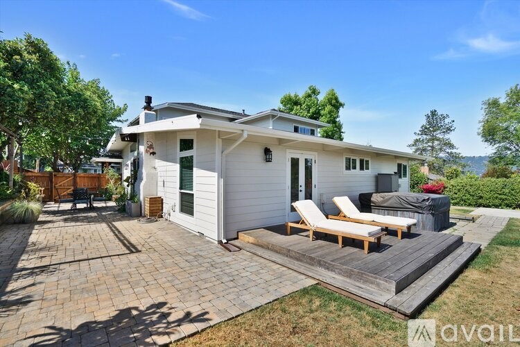 A house with a patio and a deck.