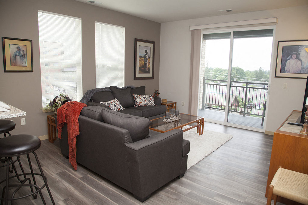 a living room with a couch and a table