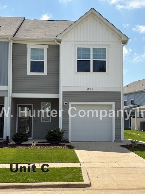A house with the text "Unit C" in front of it.