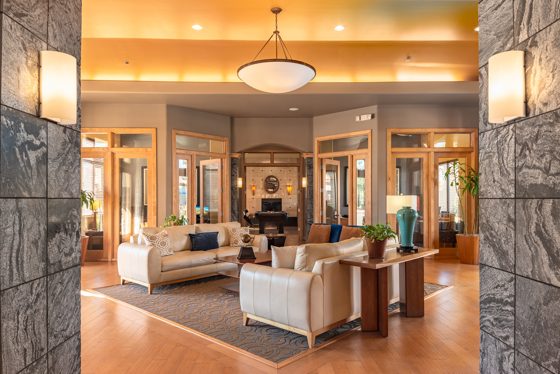 a living room with couches and a table
