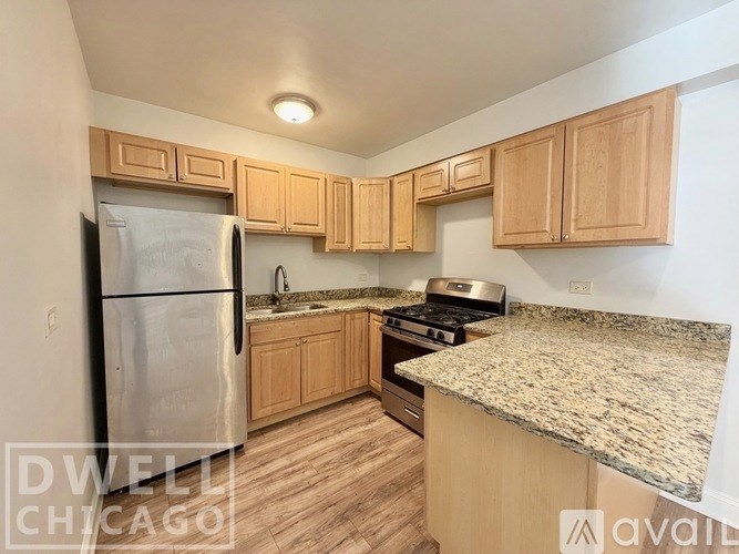 A room with a window and a radiator on the wall.
