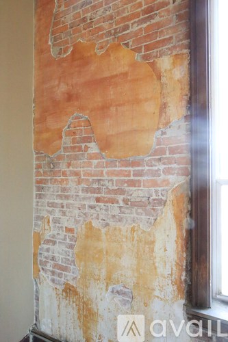 A wall with a large hole in it.