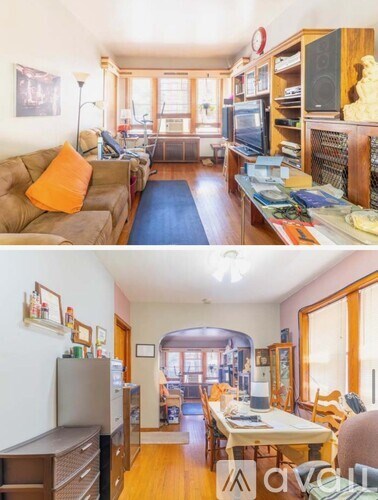 A living room with a couch and a television.