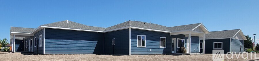 A row of blue houses with the word 'avail' on the right.
