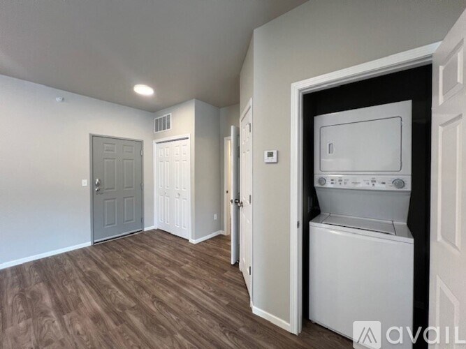 A laundry room with a washer and dryer in it.