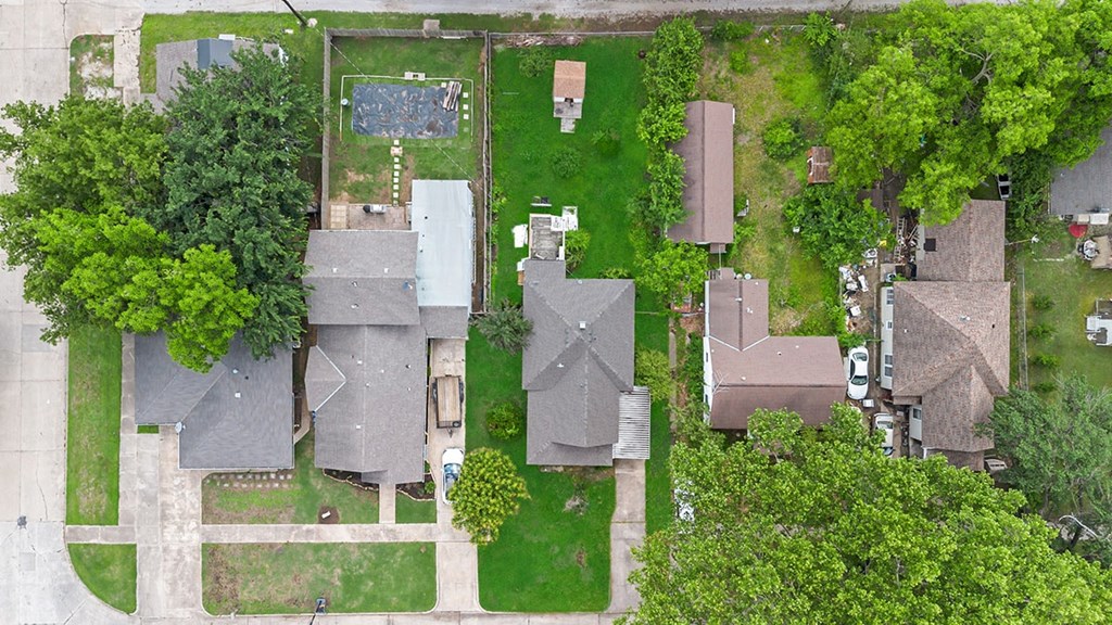 A residential area with houses and a park.