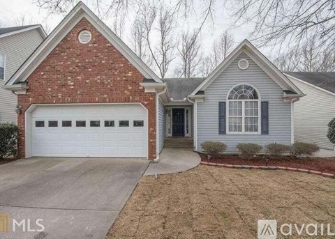A two-story house with a garage is available on the market.