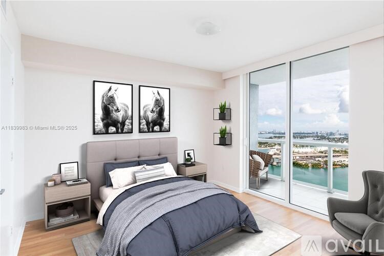 A bedroom with a large bed and a view of the city.