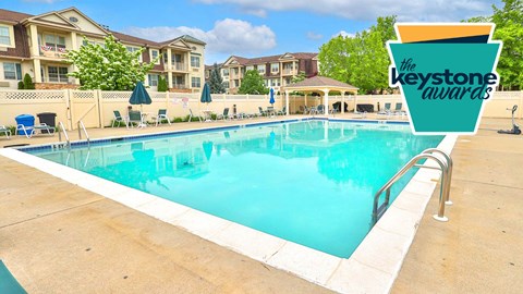 A pool with a sign that says Keystone Awards.