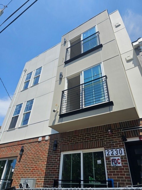 A modern building with the number 2230 on the front.