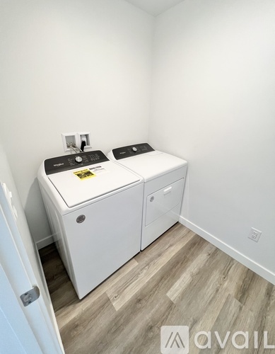 A small bathroom with a white cabinet and sink.