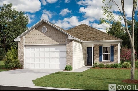 A house with a white garage door and a brown roof.