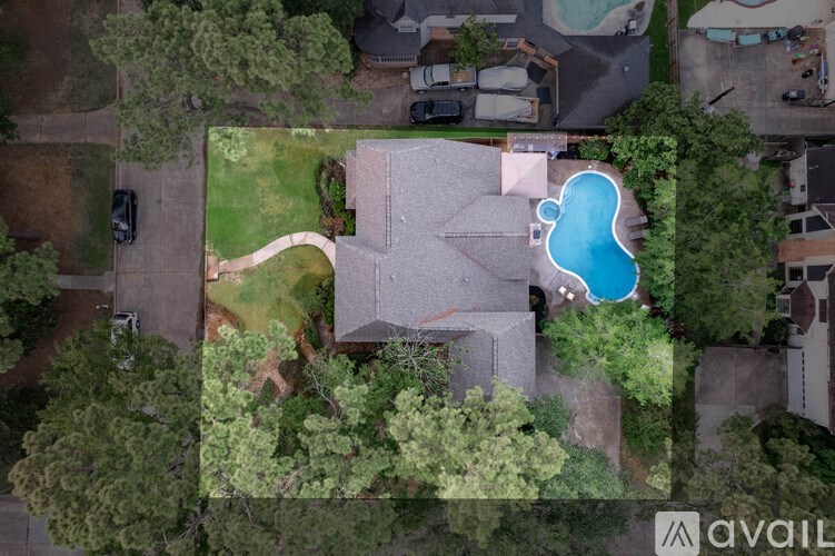A house with a pool in the backyard.