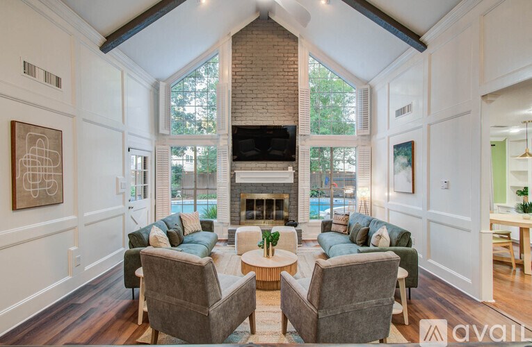 A living room with a fireplace and a couch.