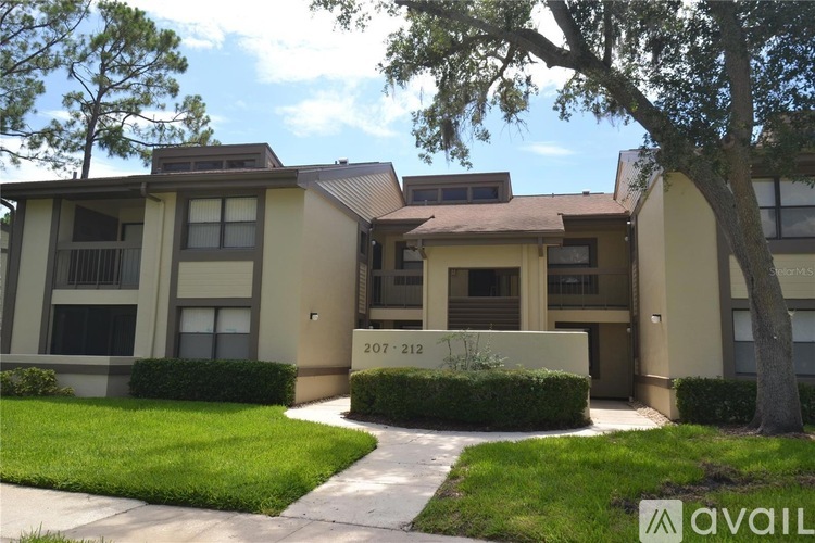 Apartment building with the number 207-212 on the front.