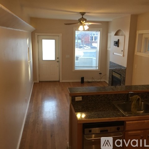 A kitchen with a counter and sink.