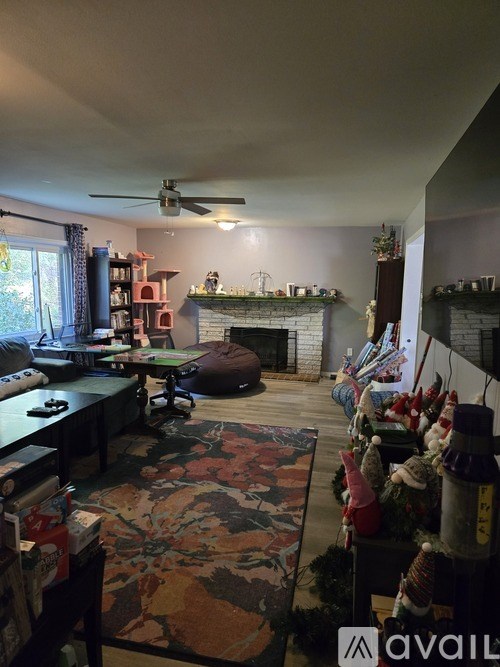 A kitchen with wooden cabinets and a table.