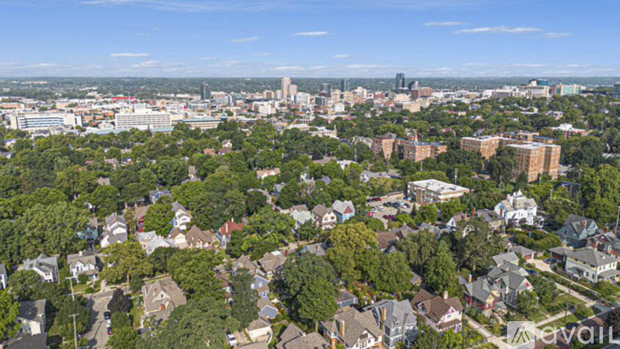 A bird's eye view of a residential area with houses and trees.