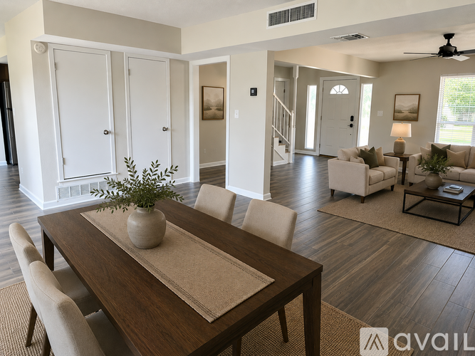 A kitchen with wooden cabinets and a black stove top oven.
