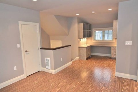 A kitchen area with a counter and a window.