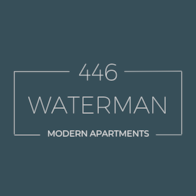 A logo for 446 Waterman, a modern apartment complex.