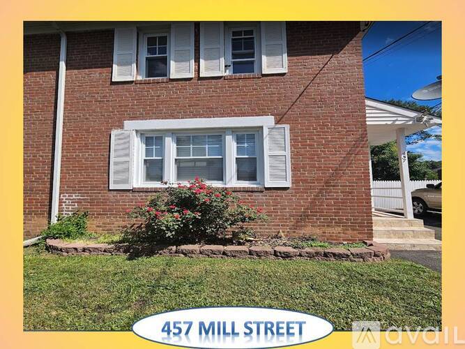 A house with the address 457 Mill Street is shown.