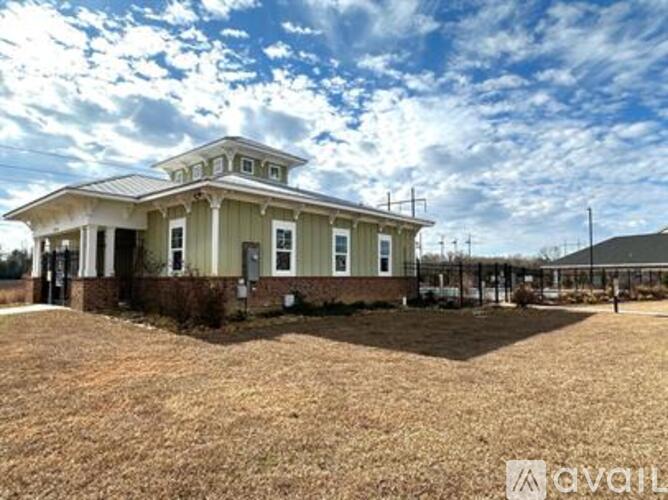 A house with a porch and a covered entrance is available for purchase.