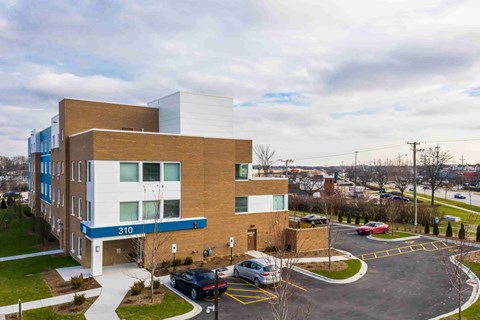 A modern building with the number 310 on it.