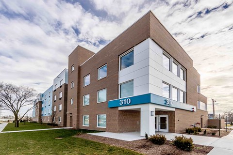 A modern building with the number 310 on the front.