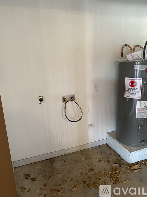 A wall-mounted heater with a stop sign on it.