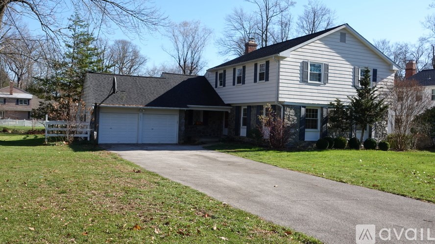 A house with a garage is available for sale.