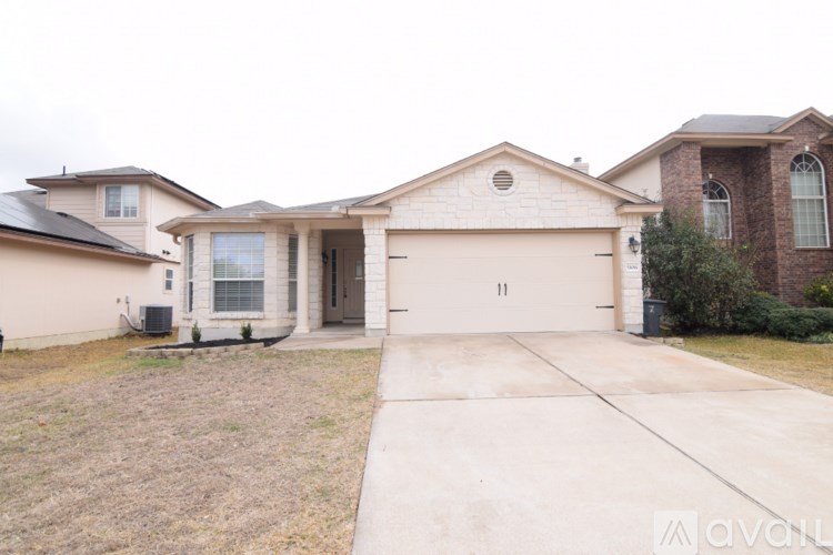 A house with a garage is available for rent.