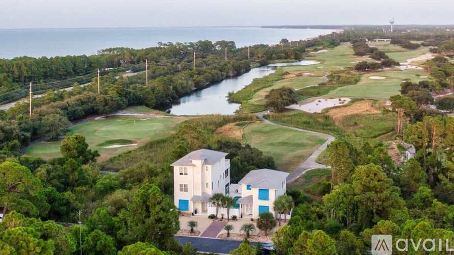 A house with a pool is for sale.