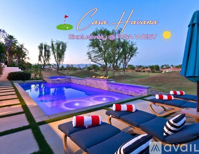 A poolside scene with a sign that reads "Casa Harana Exclusive by PGA West."