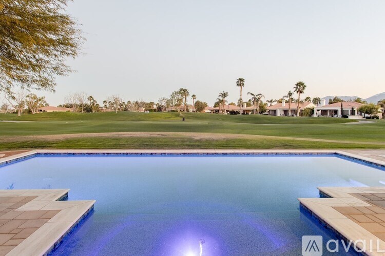 A pool with a light on the bottom of it.