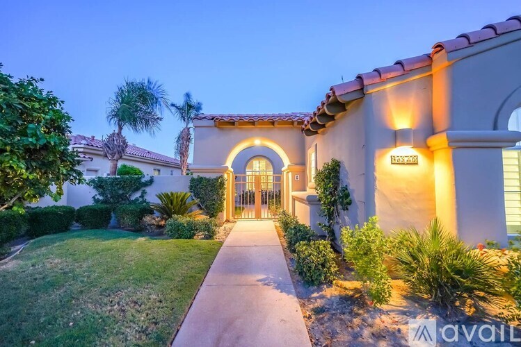 A house with a lit up sign that says "Hawaii" is shown.