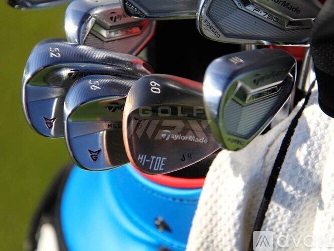A set of golf clubs with the brand name "Srixon" visible on the irons.