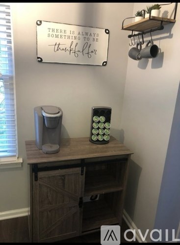 A sign on the wall says "There is always something to be thankful for".