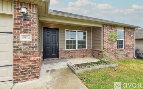 A house with the number 5974 on the front door.